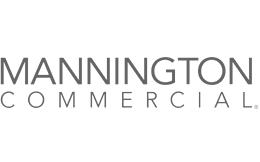 Mannington Commercial logo with the company name in bold, black uppercase letters, representing a leading commercial flooring company.